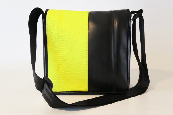 Upcycling Bags made from a used yellow fire hose and tarpaulin