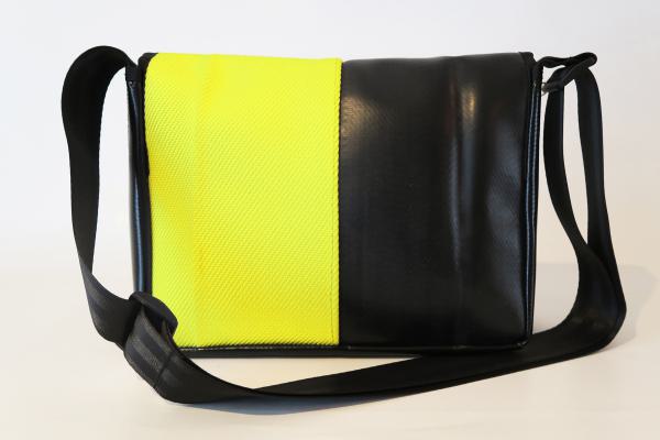 Upcycling Bags made from a used yellow fire hose and tarpaulin