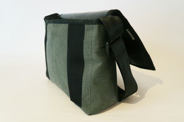 Upcycling bag made from a used tractor hose and amry tent linen