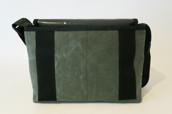 Upcycling bag made from a used tractor hose and amry tent linen