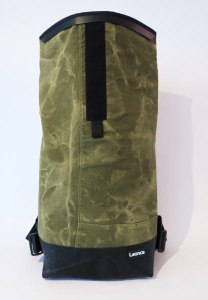 Upcycling Backpack, made of olive army tent Canvas, tractorhose and Seatbelts, the interior is made of Tarpaulin in 3 sizes